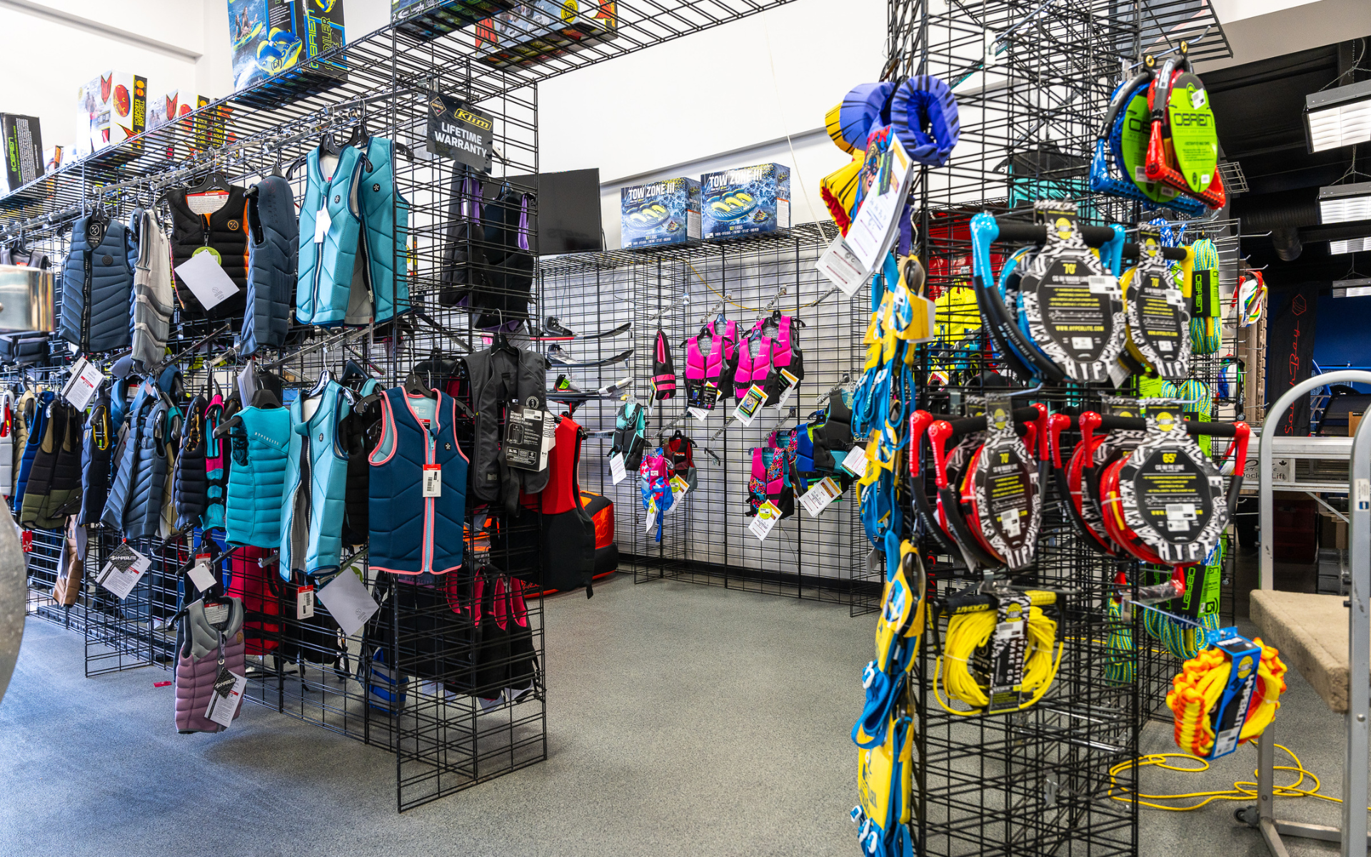 Interior of Martin Motorsports showroom in Calgary featuring clothing, gear and accessories