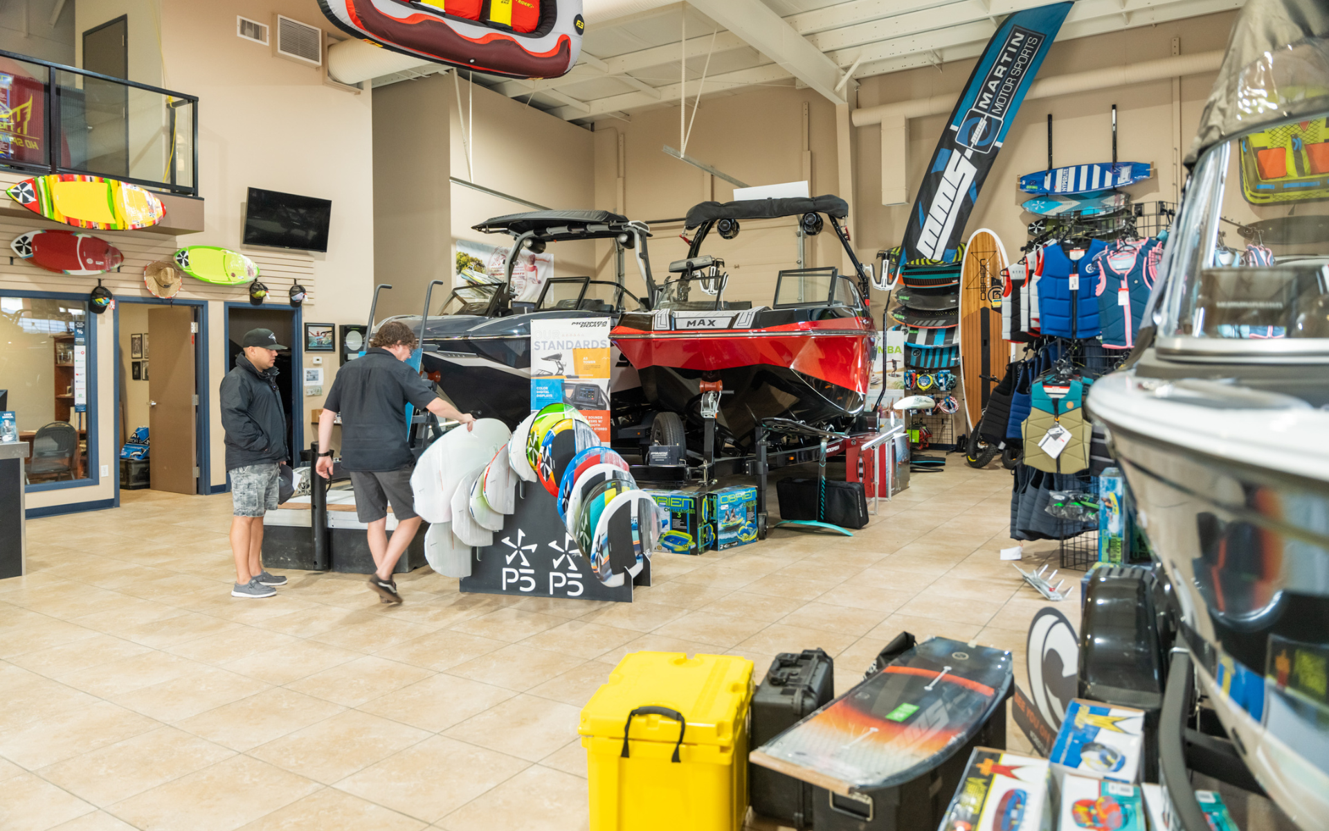 Interior of Martin Motorsports showroom in Saskatoon featuring clothing, gear and accessories